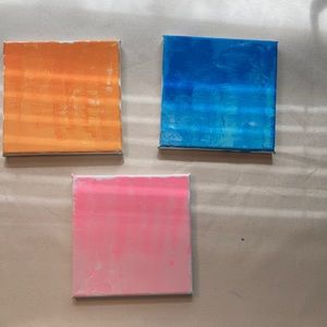 3 ombre paintings pink blue and orange